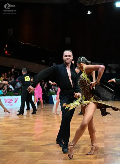 Dancesport competitor #53: Male dancer: black long-sleeved shirt and black trousers