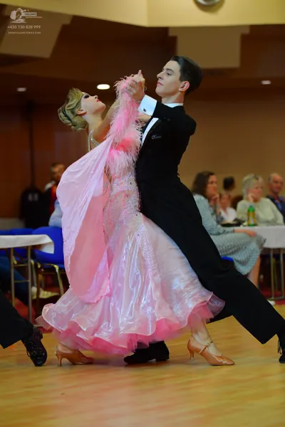 Dancesport competitor: Male dancer: black suit