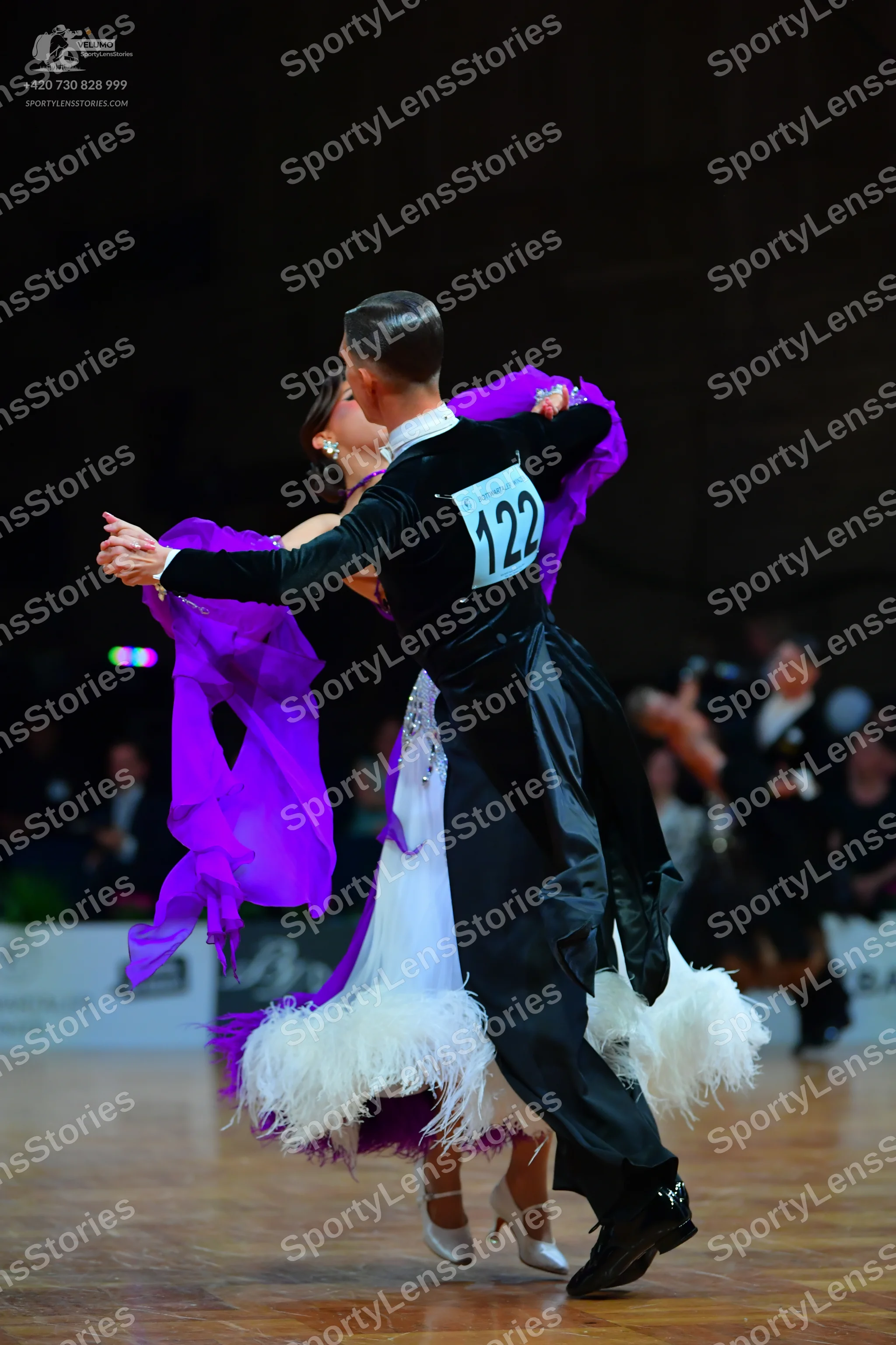 Dancesport competitor #122: Male dancer: black long-sleeved top and black trousers