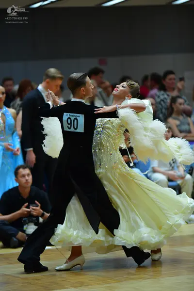 Dancesport competitor #90: Male dancer: black suit