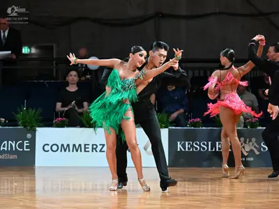 Dancesport competitor: Male dancer: black suit