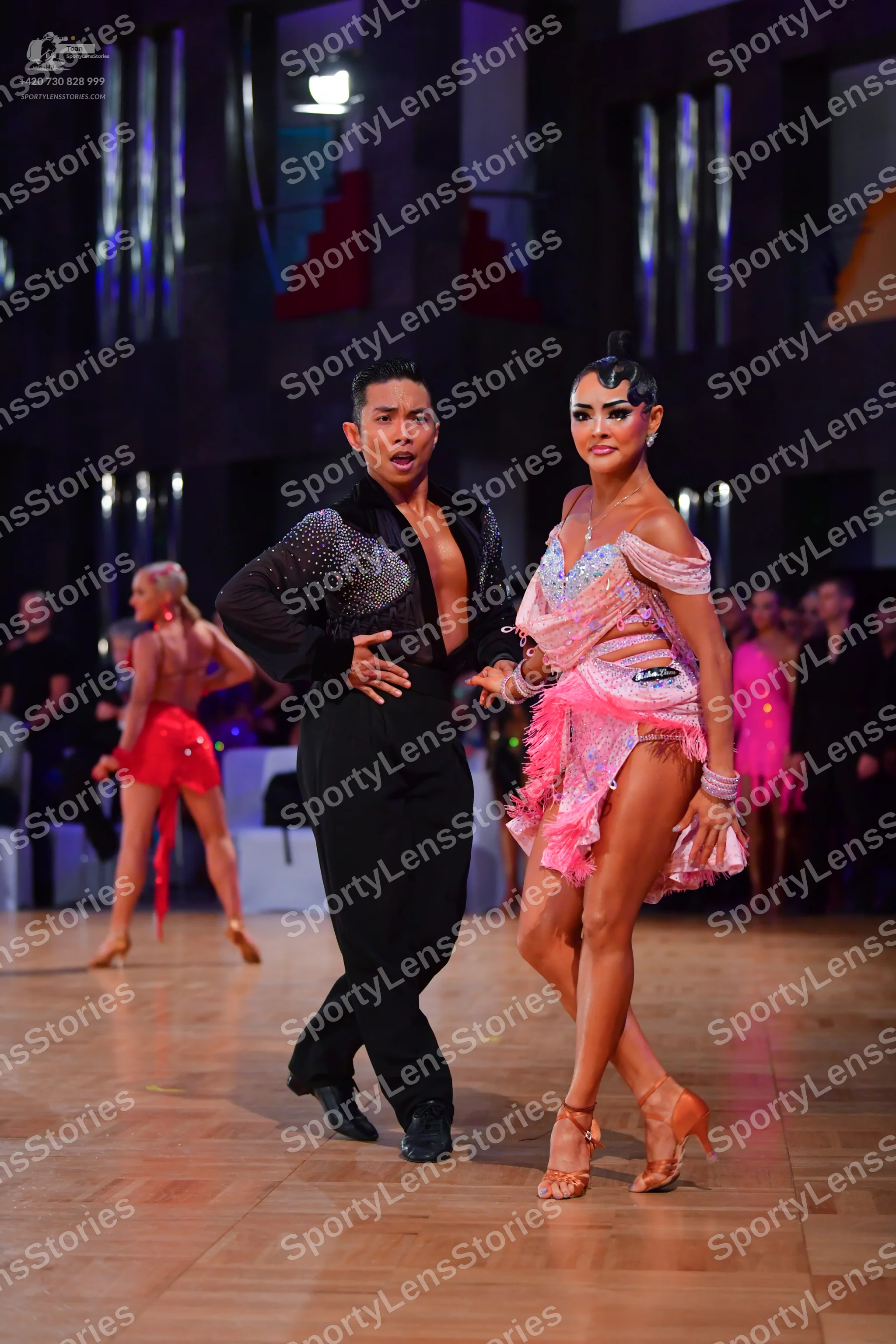 Dancesport competitor #145: Male dancer: black long-sleeved shirt with subtle sequins and black trousers
