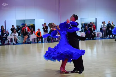 Dancesport competitor: Male dancer: black suit