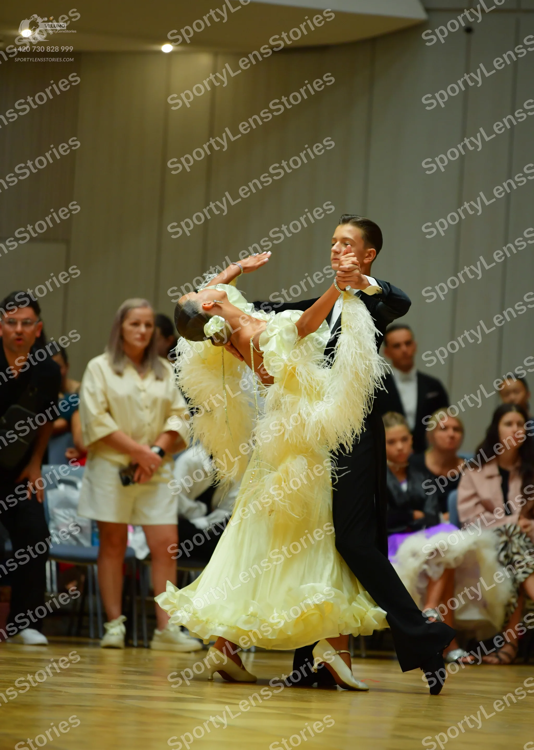 Dancesport competitor: Male dancer: black suit with a white shirt