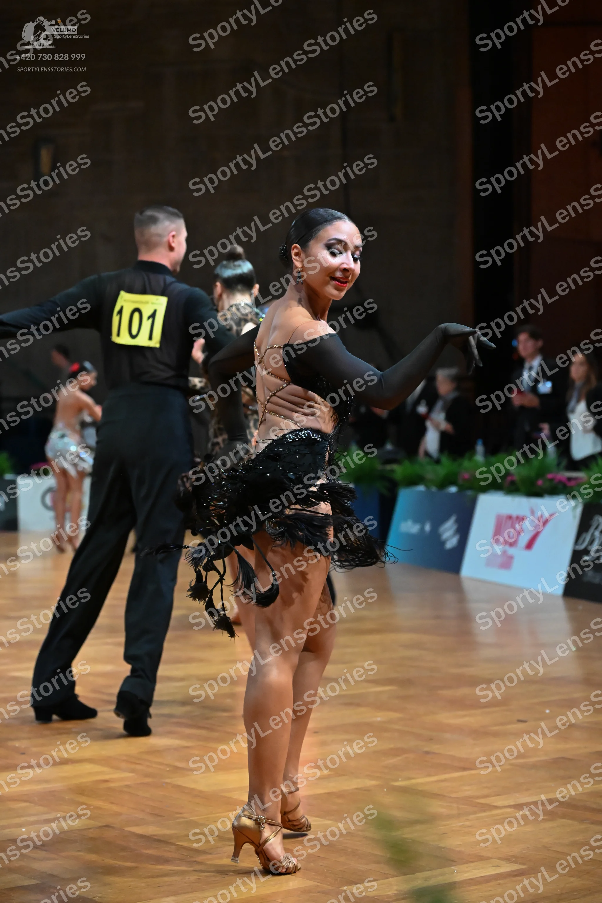 Dancesport competitor #101: Male dancer: black long-sleeved shirt and black trousers