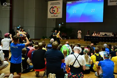 Dancesport competitor: Male dancer: black shirt and black trousers