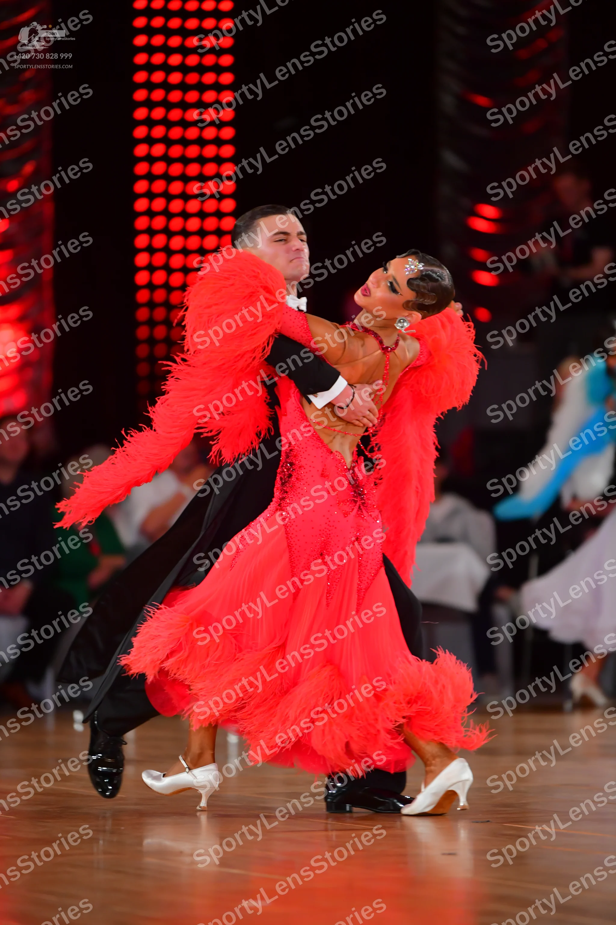 Dancesport competitor: Male dancer: black formal suit with a white shirt and black bowtie