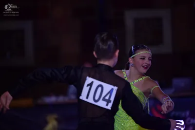Dancesport competitor #104: Male dancer: black long-sleeved shirt