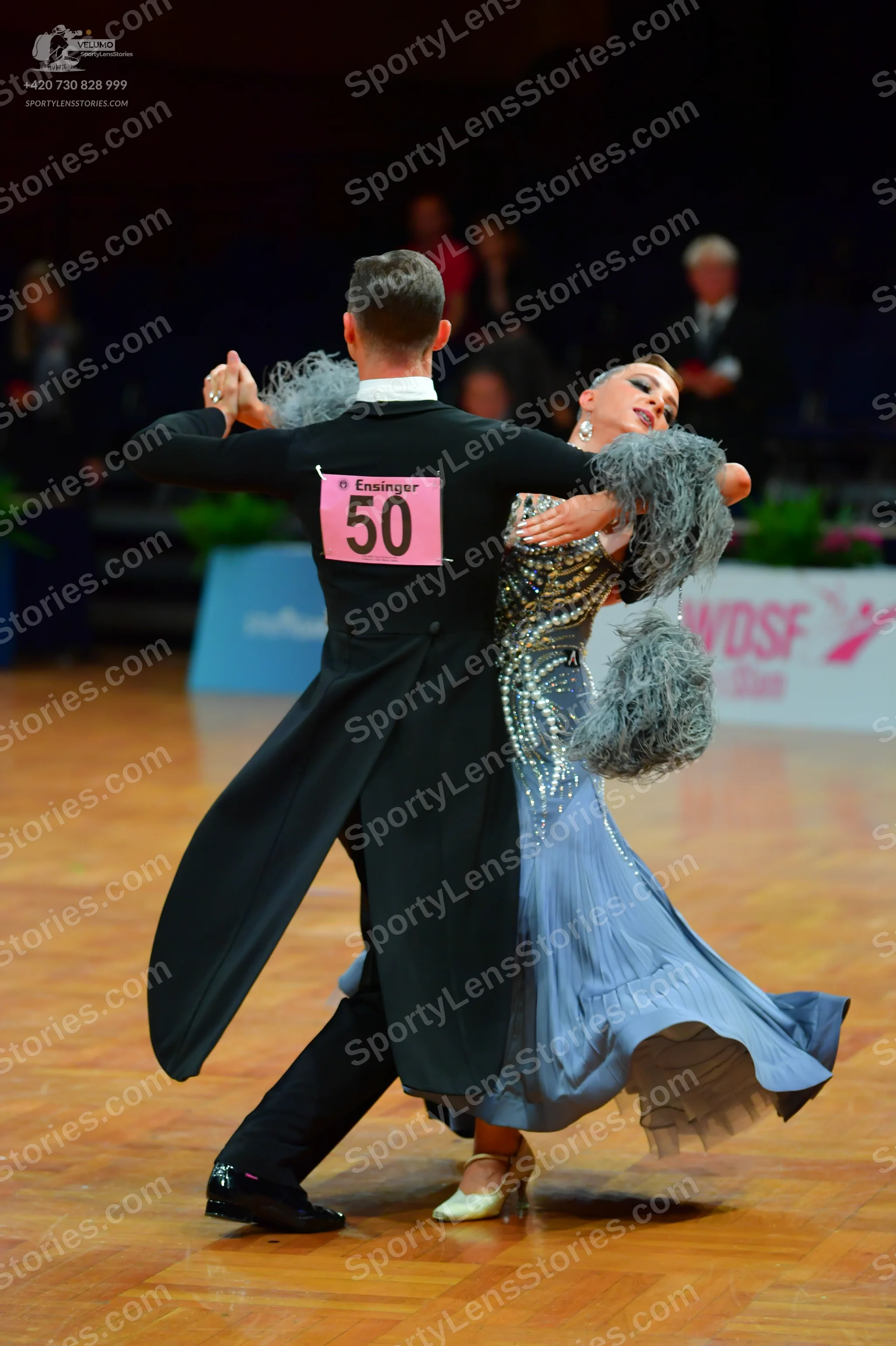 Dancesport competitor: Male dancer: black tailcoat with a white shirt and black bow tie