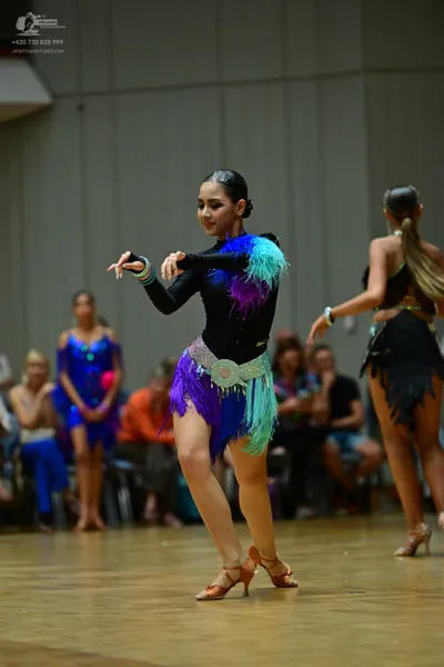 Dancesport competitor: ** Blue and white Latin dress