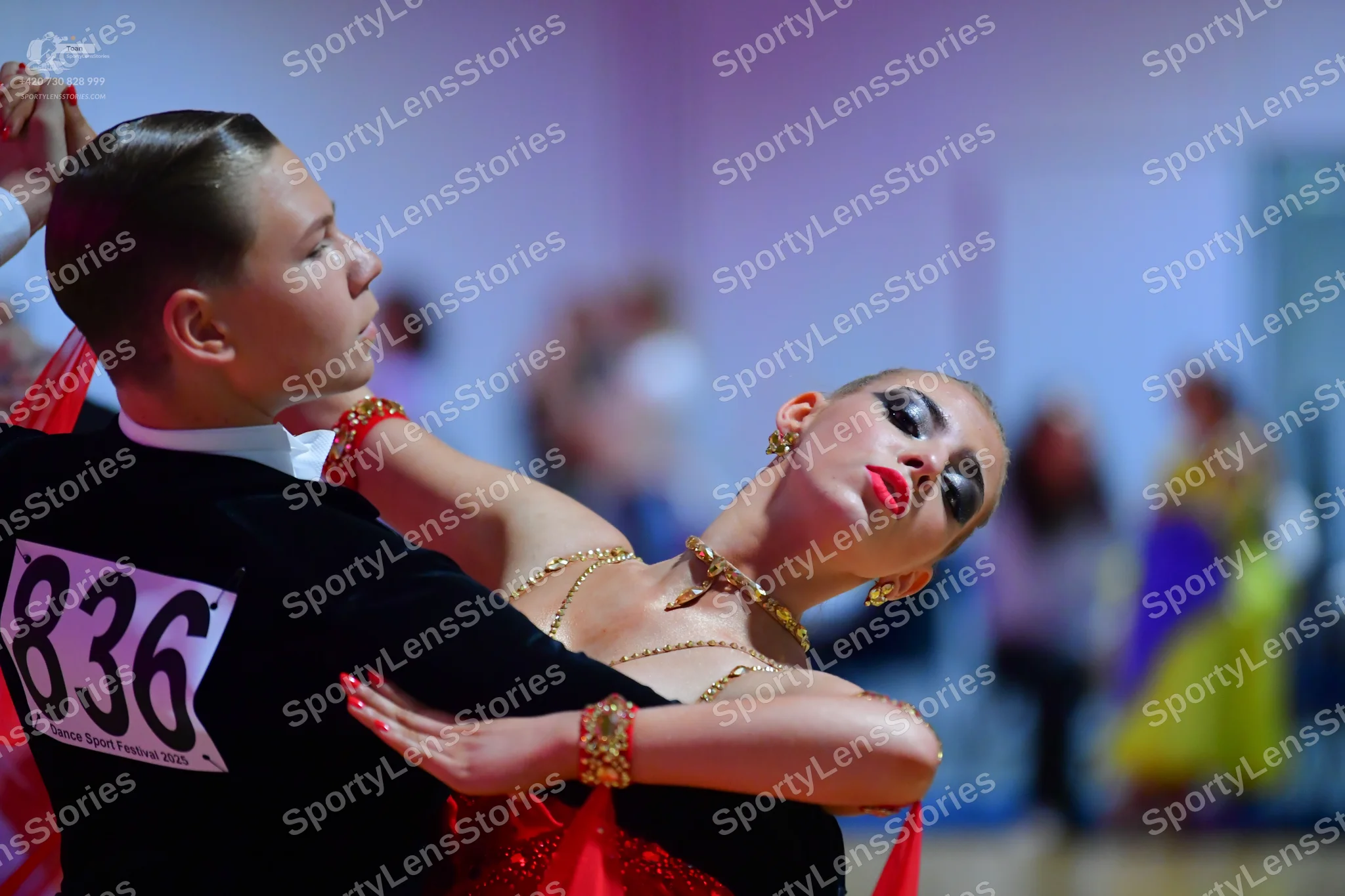 Dancesport competitor #836: Male dancer: black suit jacket