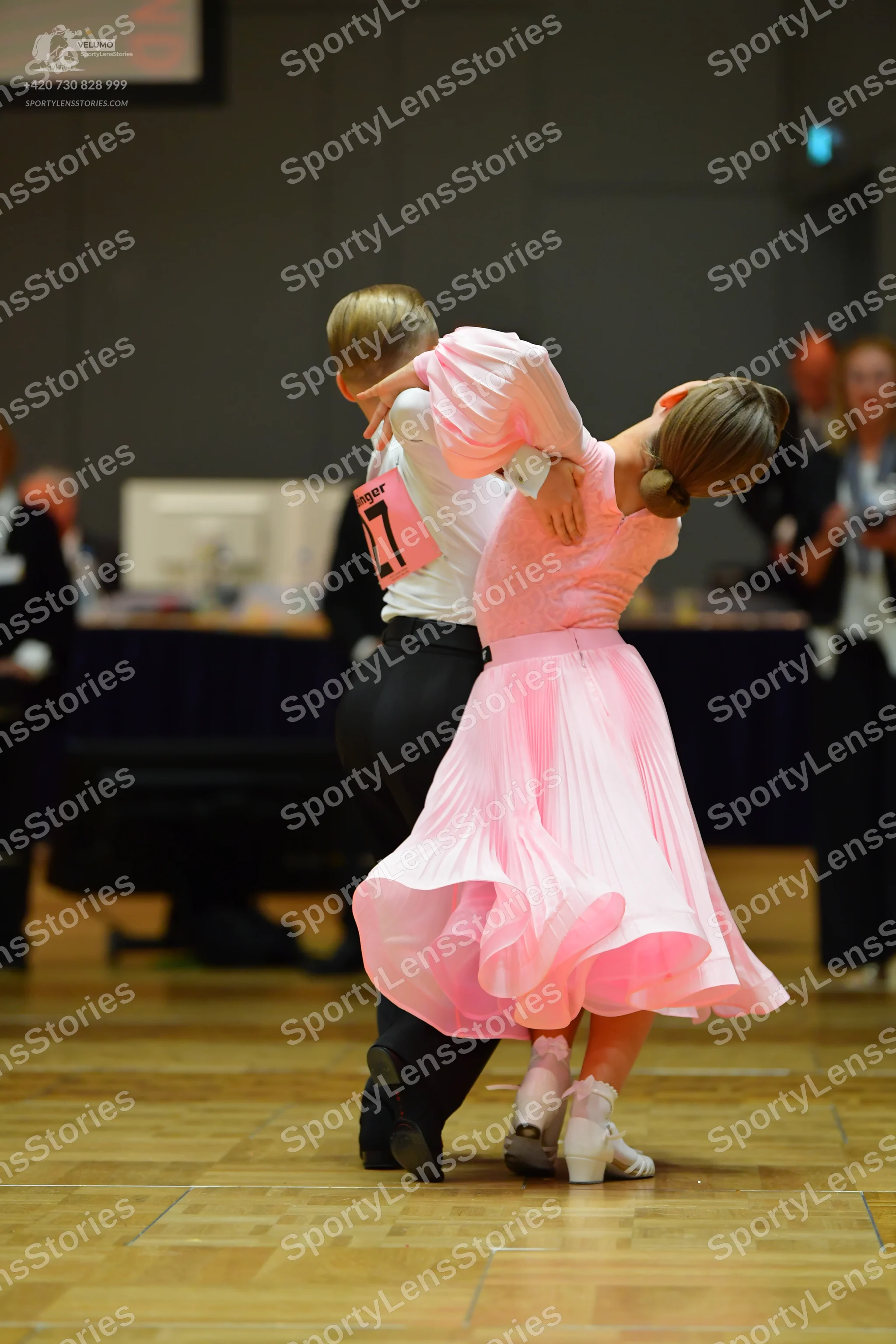 Dancesport competitor #27: Male dancer: white long-sleeved shirt and black trousers