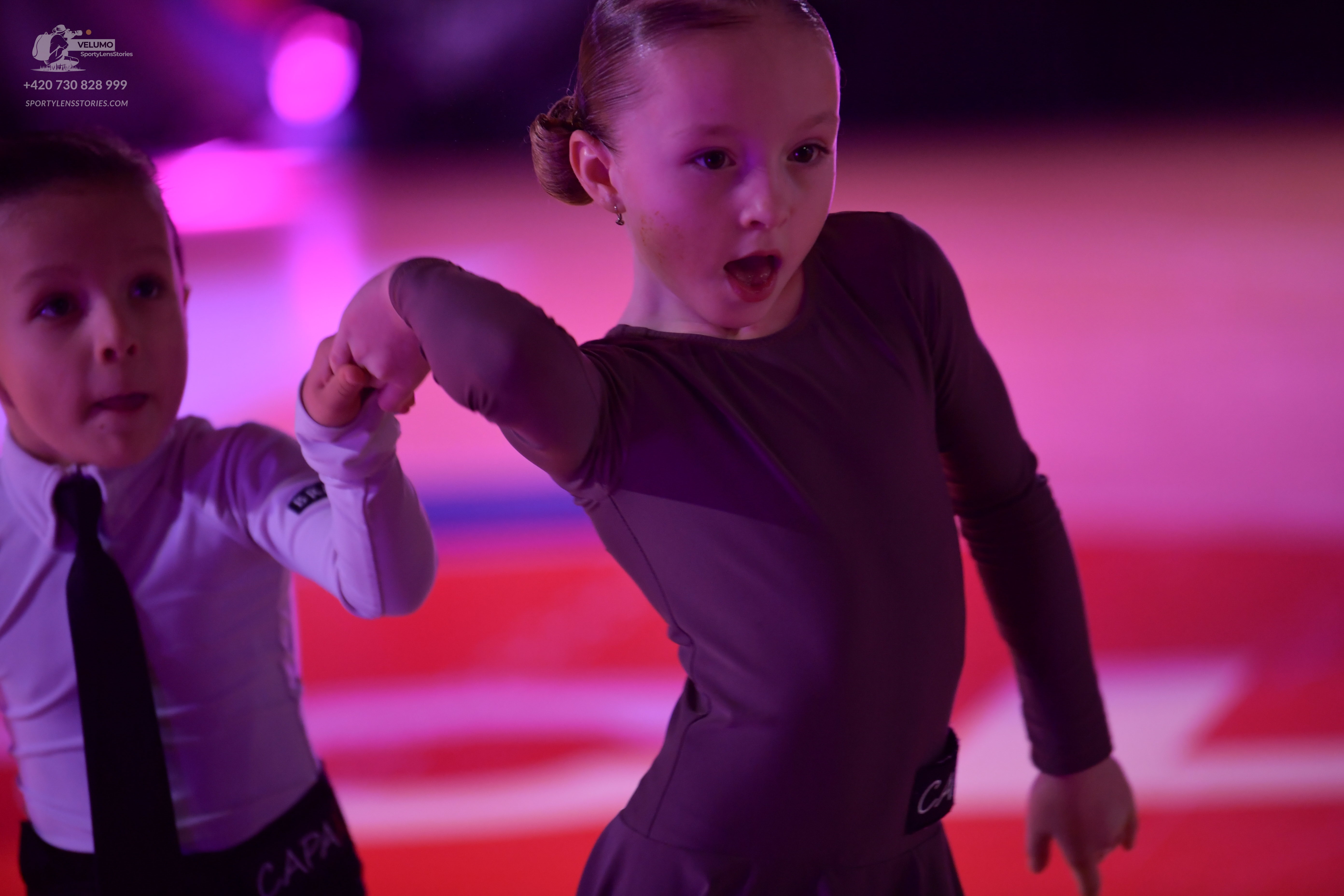 Dancesport competitor: ** Black tail suit