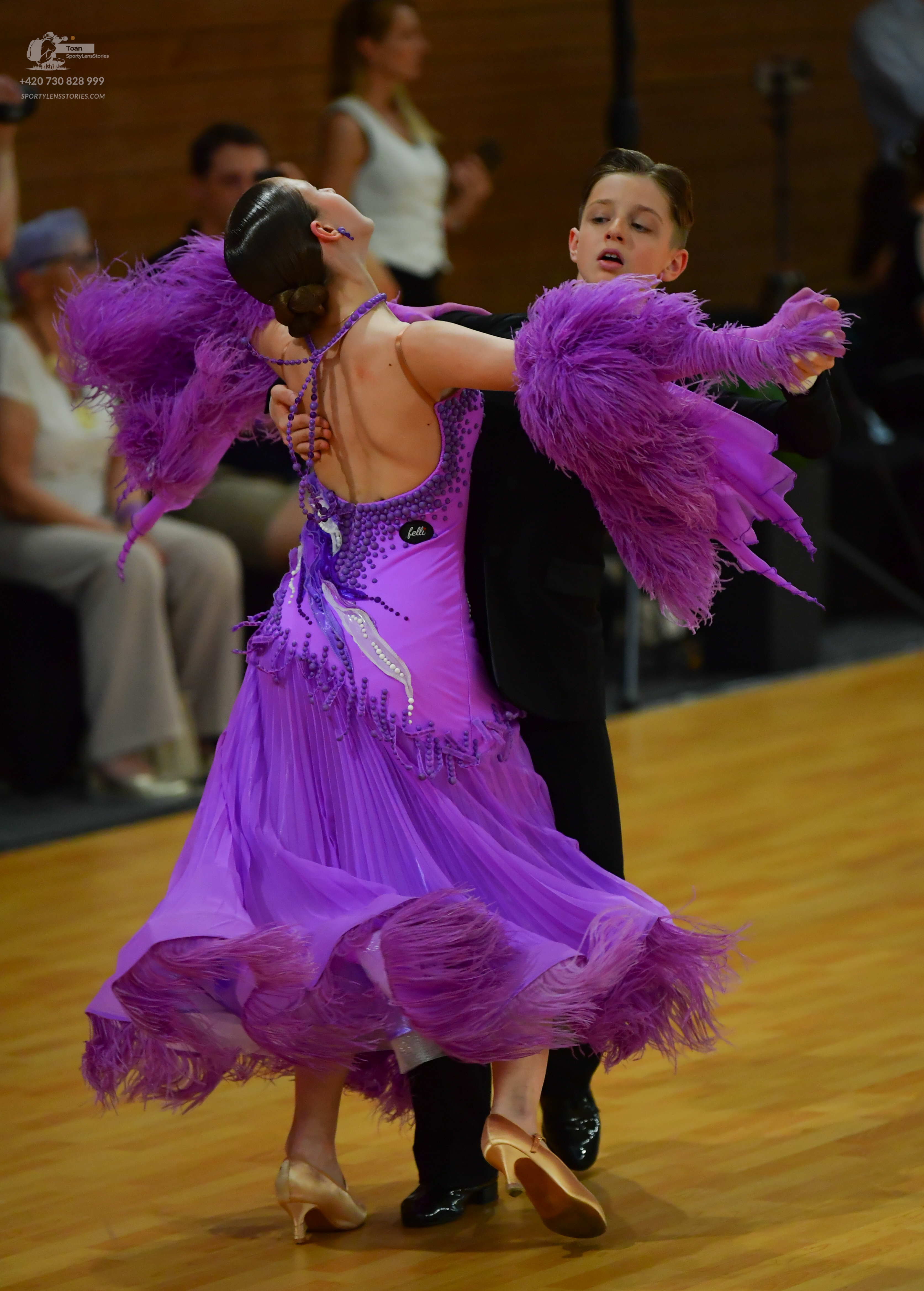 Dancesport competitor: ** Purple Latin dress