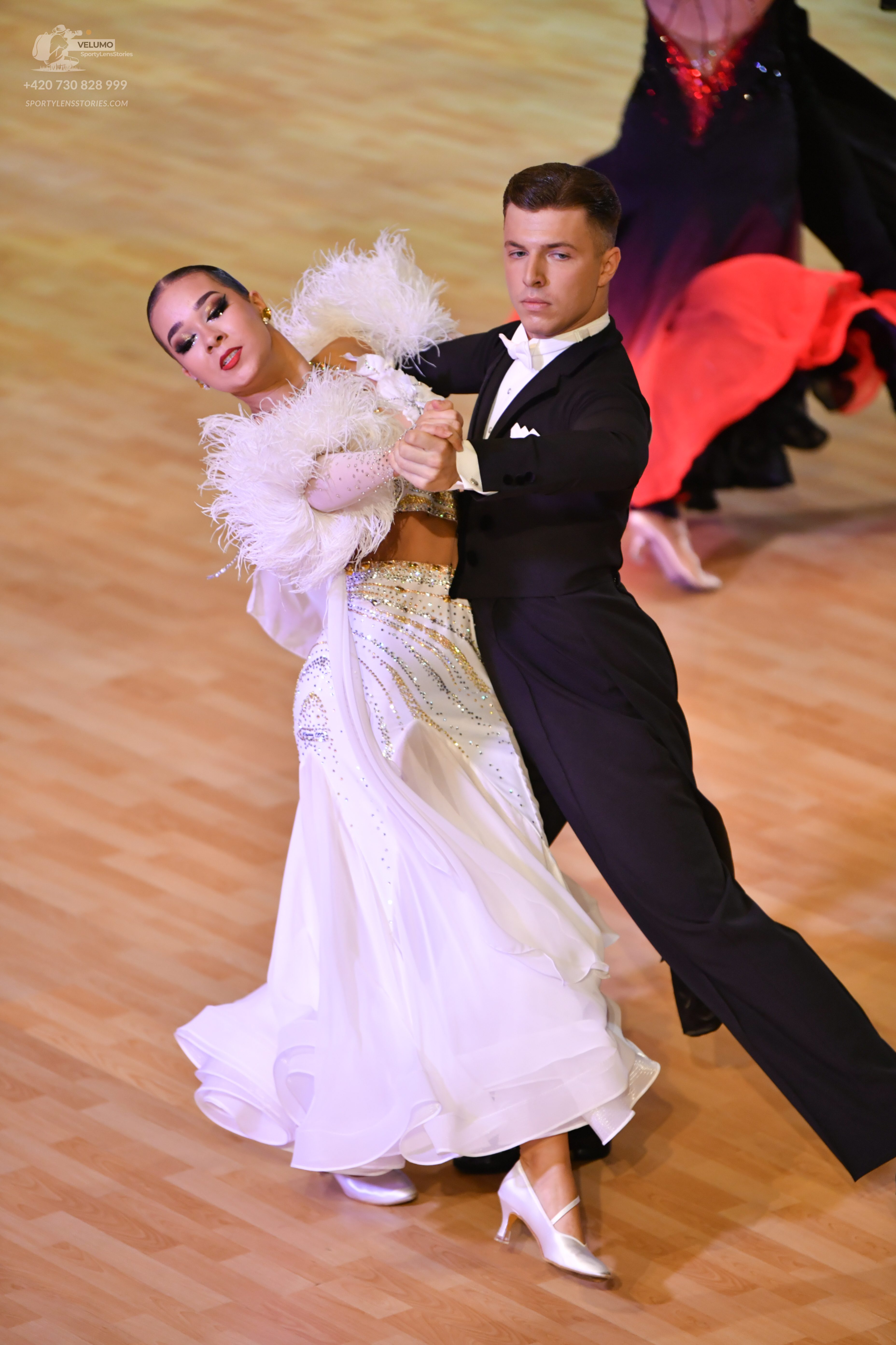 Dancesport competitor: ** Red Latin dress