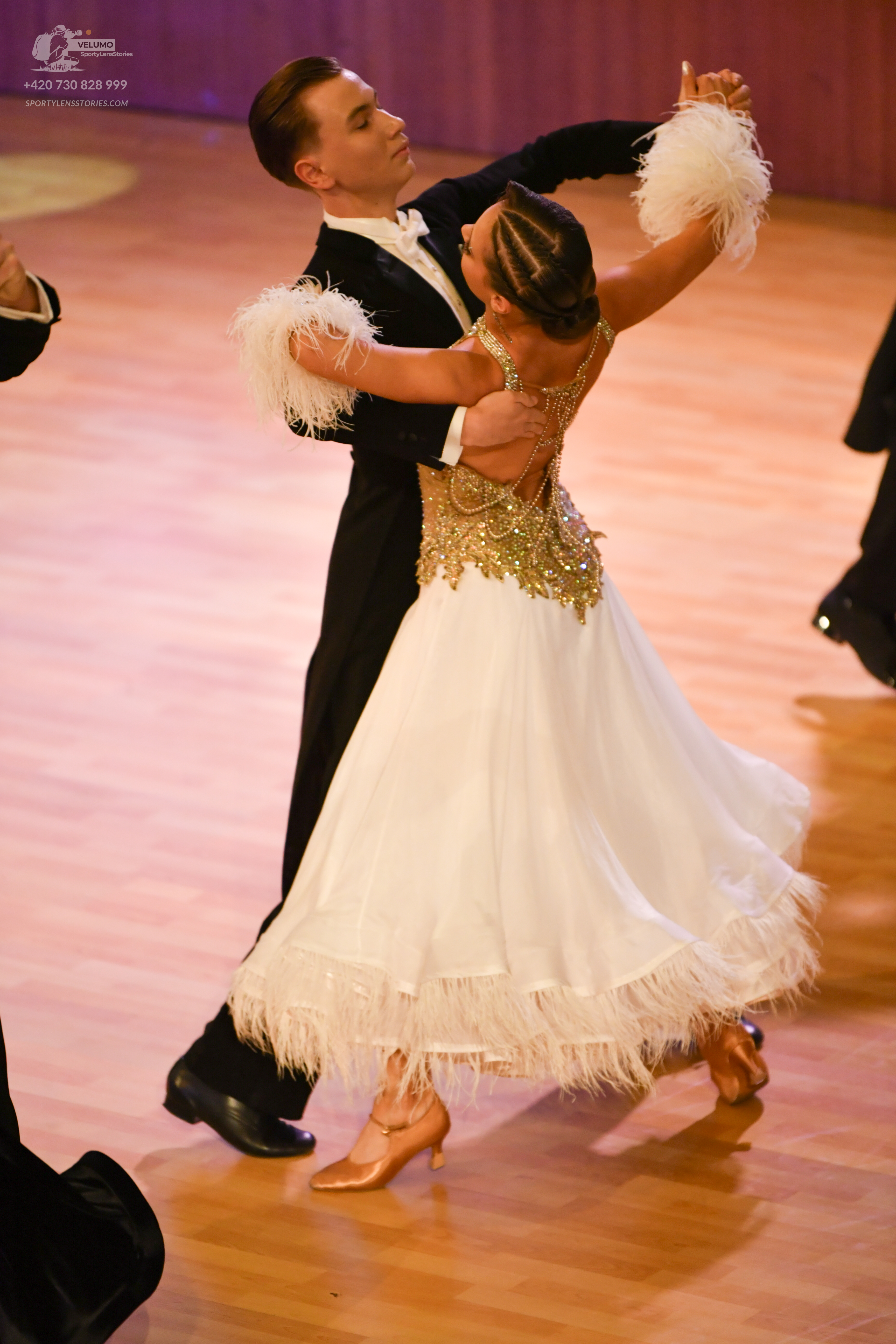 Dancesport competitor: ** Black ballroom suit