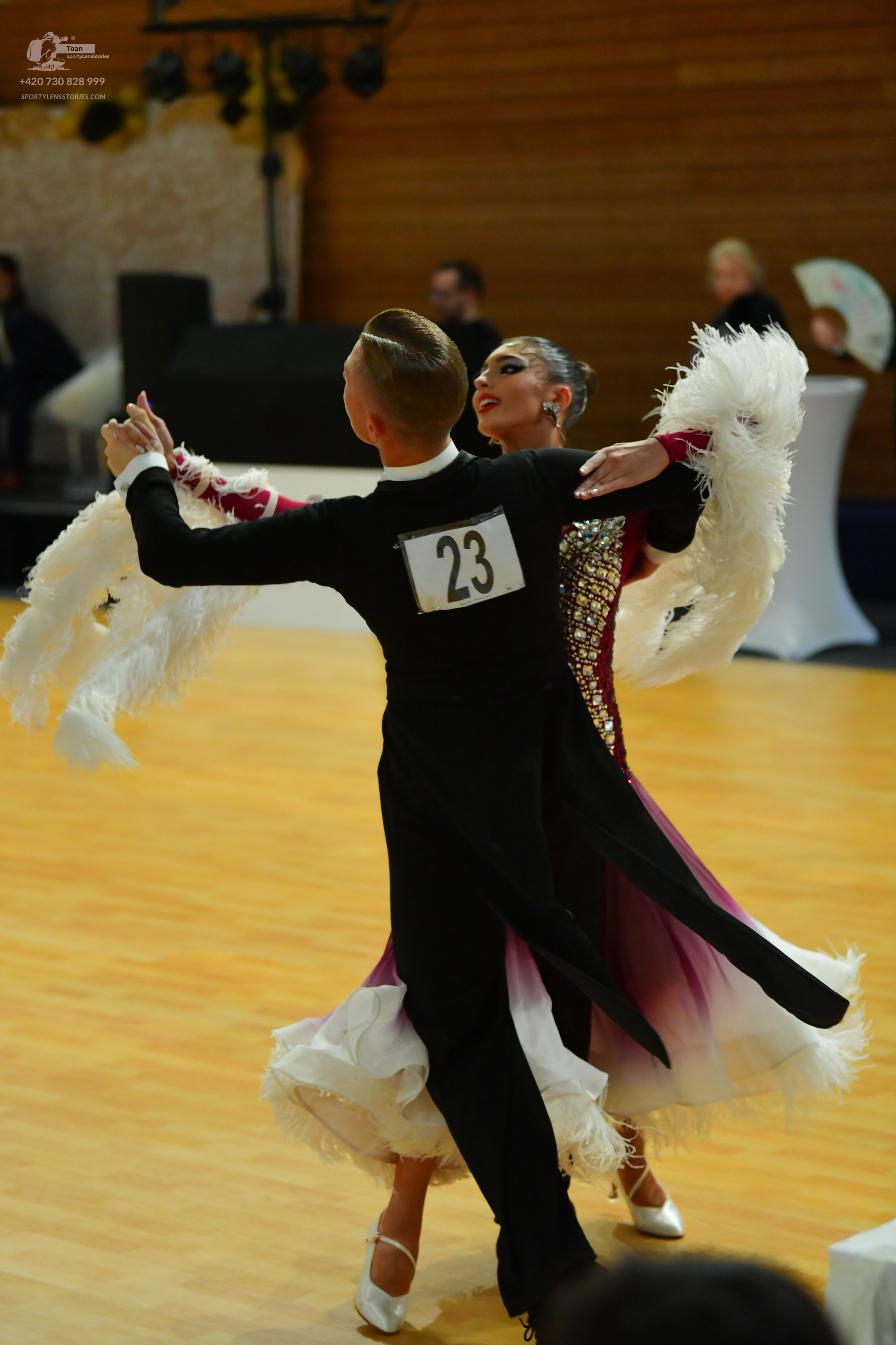 Dancesport competitor #23: Male dancer: black long-sleeved top