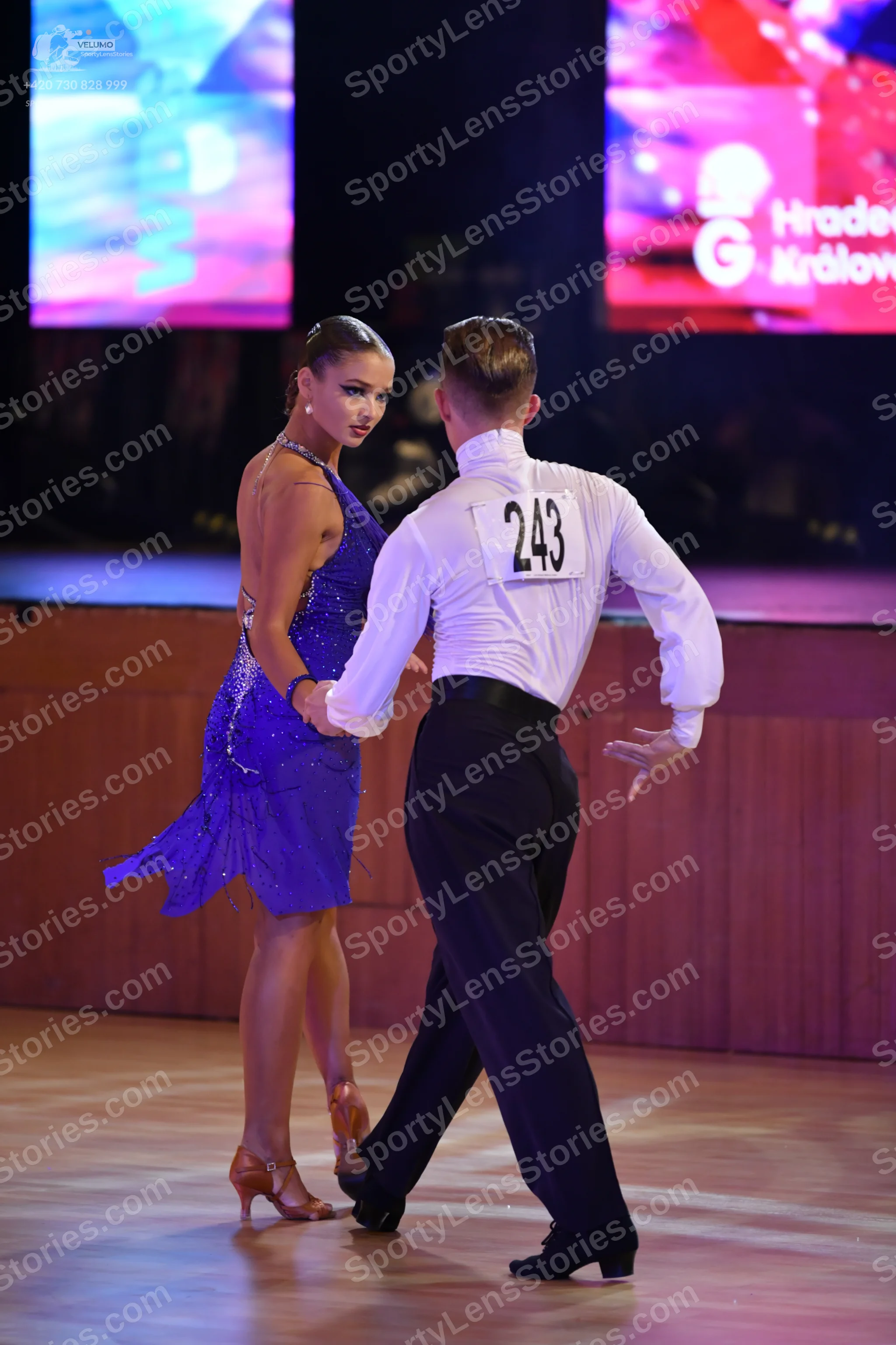 Dancesport competitor #248: Male**
*   **Color:** Black
*   **Fabric:** Sequins
*   **Style:** Tail suit wit
