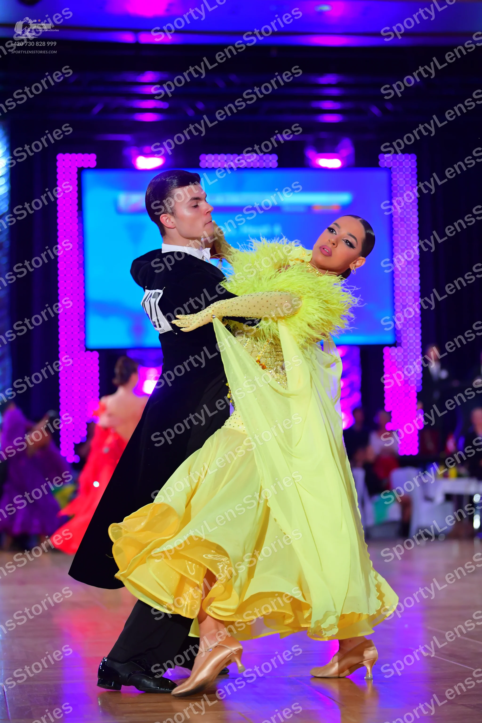 Dancesport competitor: Male dancer: black suit