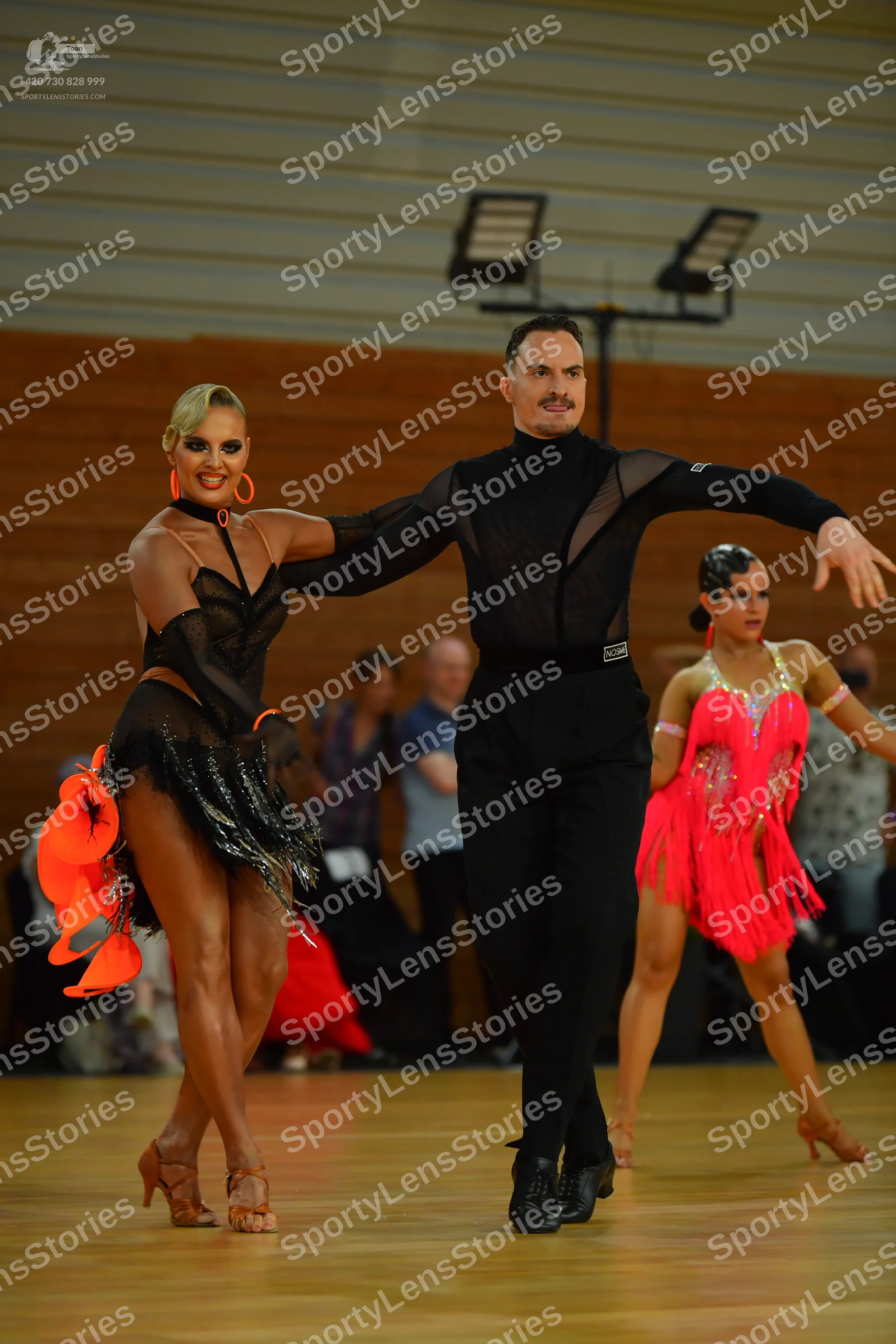 Dancesport competitor: ** Black tailsuit