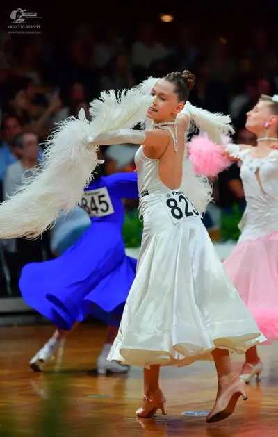 Dancesport competitor: First dancer: blue ballgown with a flowing skirt