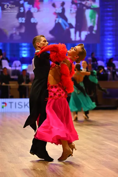 Dancesport competitor: Male dancer: black tailcoat suit with white shirt