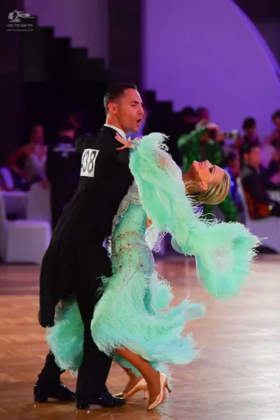 Dancesport competitor #438: Male dancer: black suit