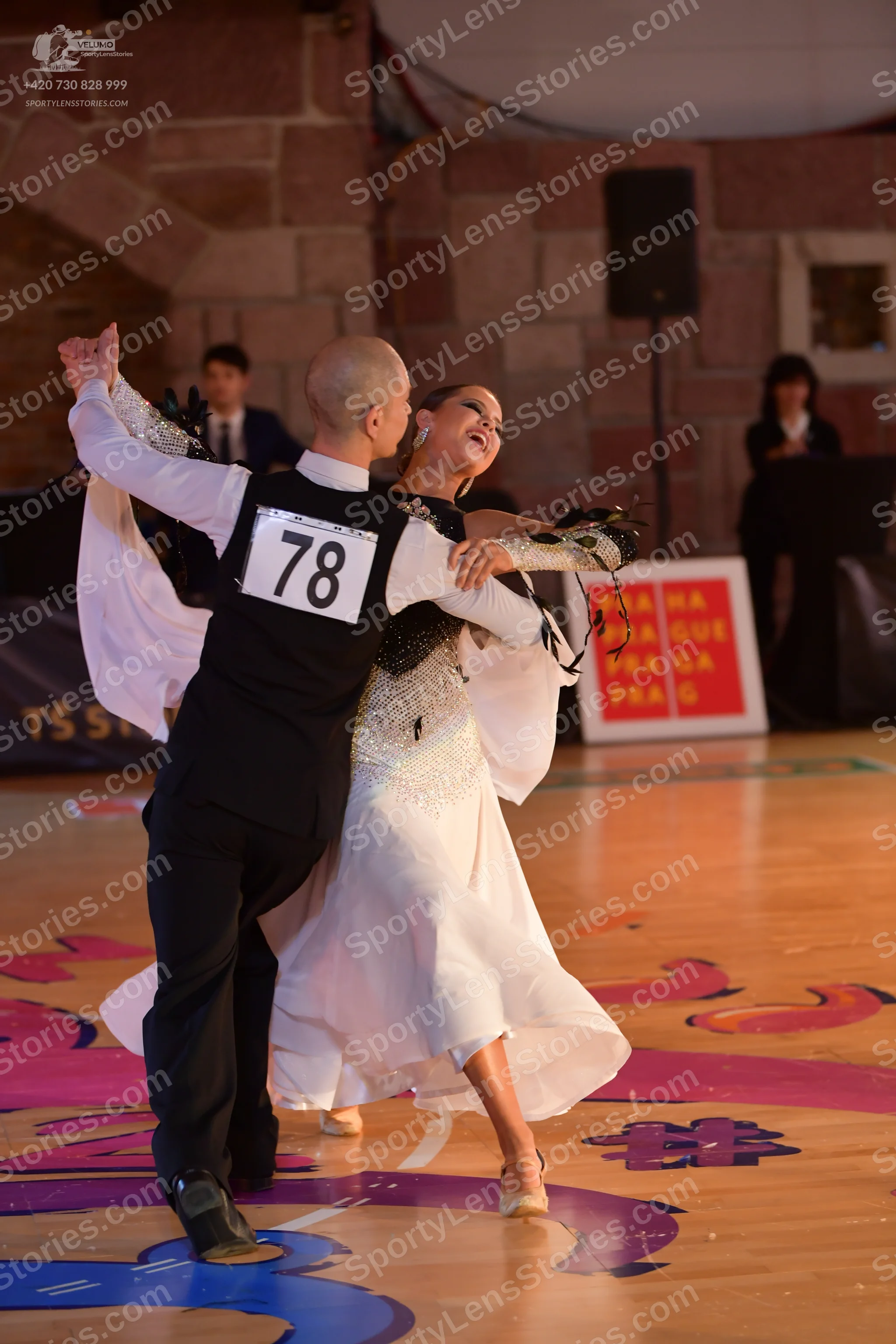 Dancesport competitor #78: Male dancer: black vest, white long-sleeved shirt, and black trousers