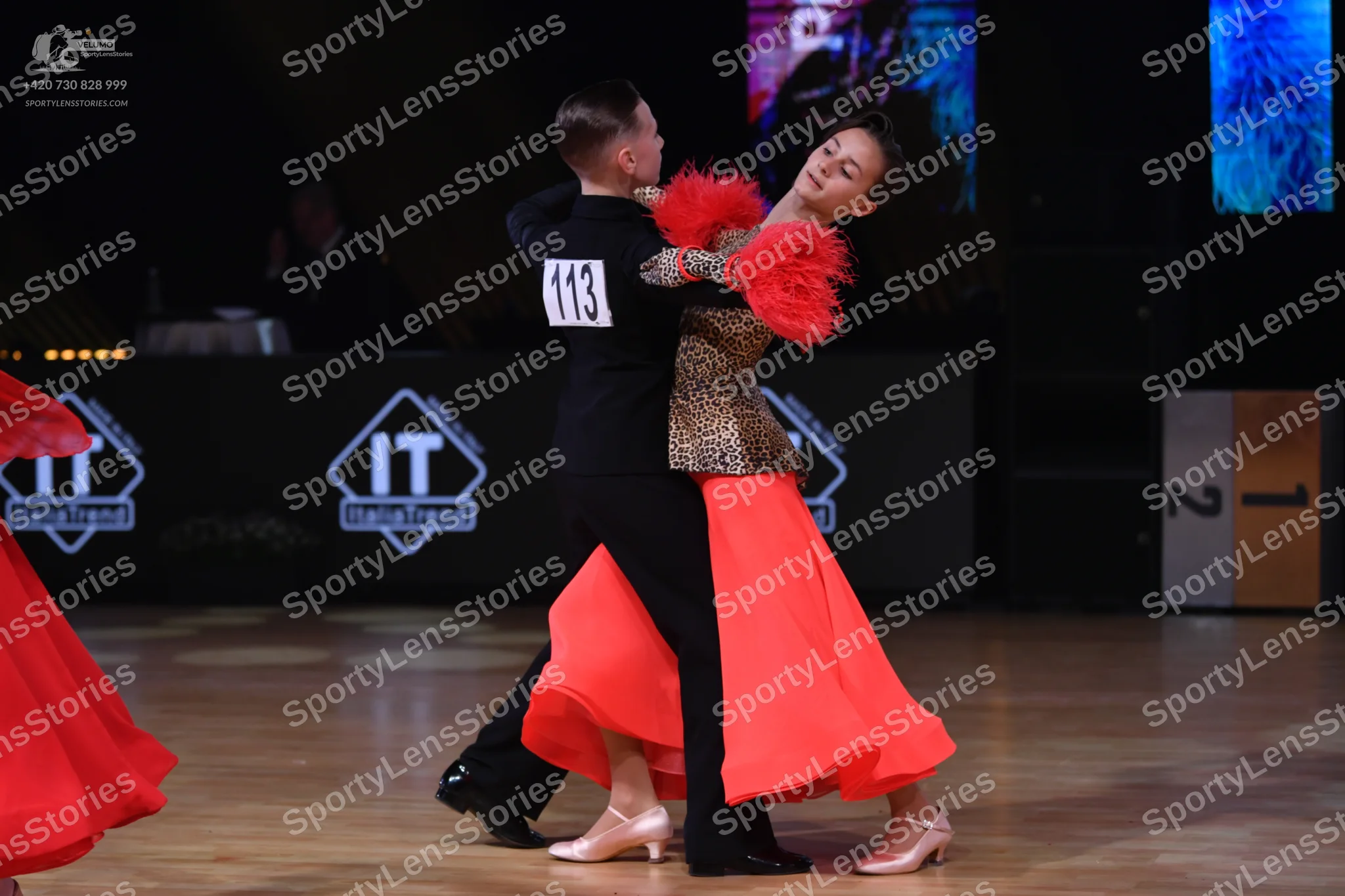 Dancesport competitor: Male dancer: black long-sleeved shirt and black trousers