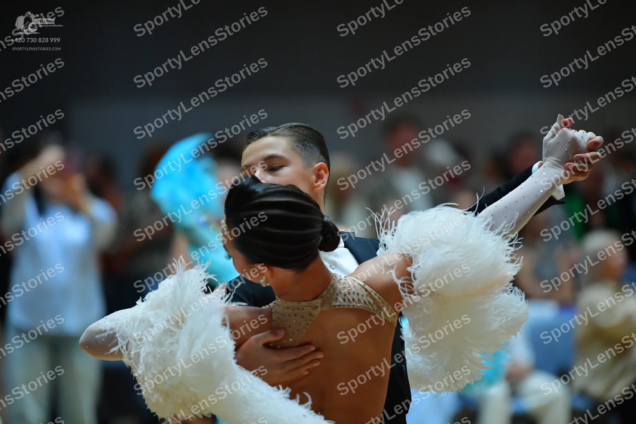 Dancesport competitor: Male dancer: black suit