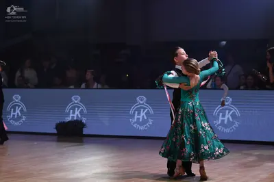 Dancesport competitor: Male dancer: black suit