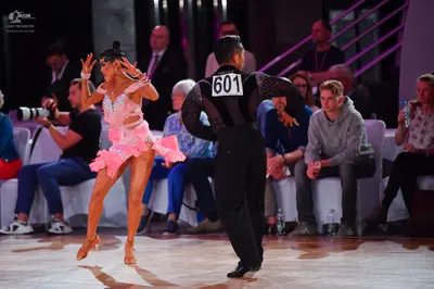 Dancesport competitor #601: Male dancer: black long-sleeved shirt with subtle shimmer and black trousers