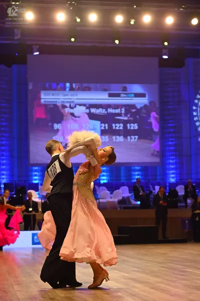 Dancesport competitor: Male dancer: black waistcoat and trousers