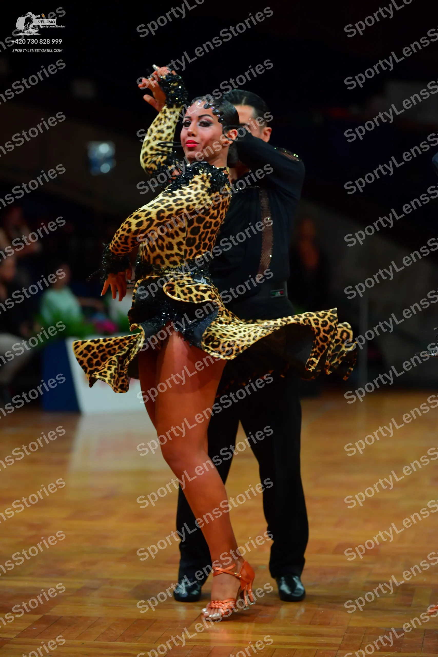 Dancesport competitor: Male dancer: black long-sleeved shirt and black trousers