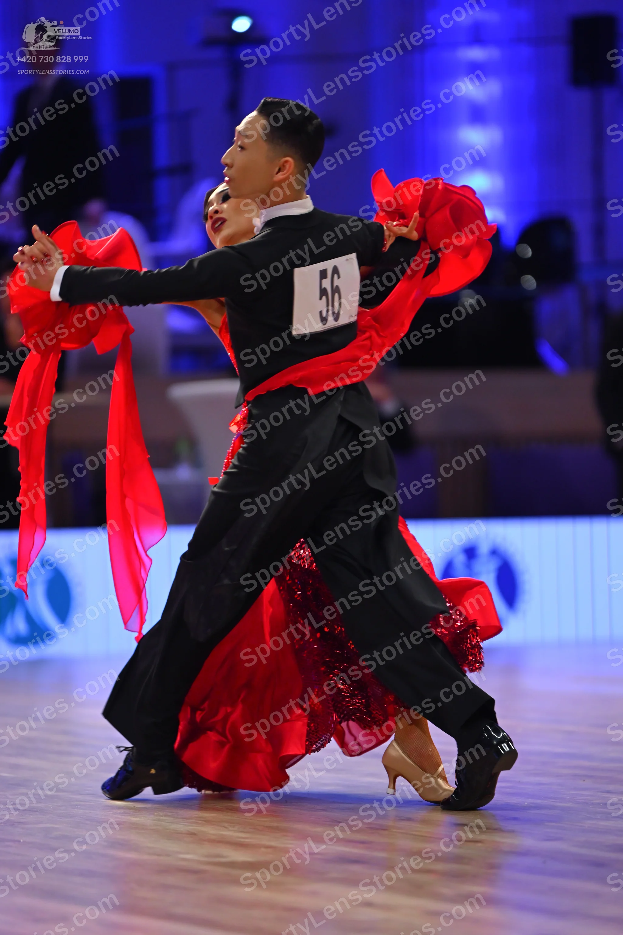 Dancesport competitor: Male dancer: black long-sleeved shirt and black trousers