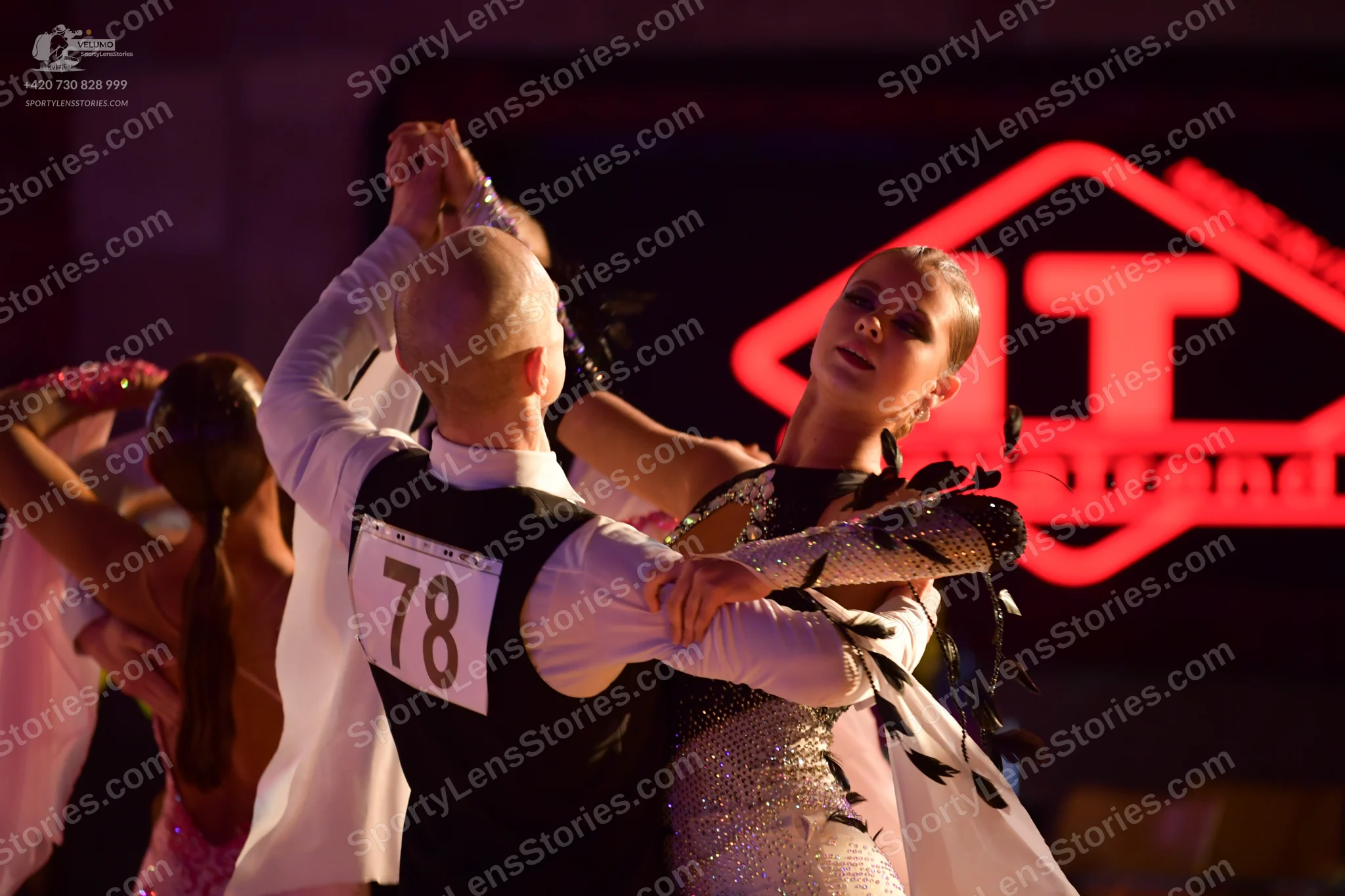 Dancesport competitor #78: Male dancer: white long-sleeved shirt and black vest