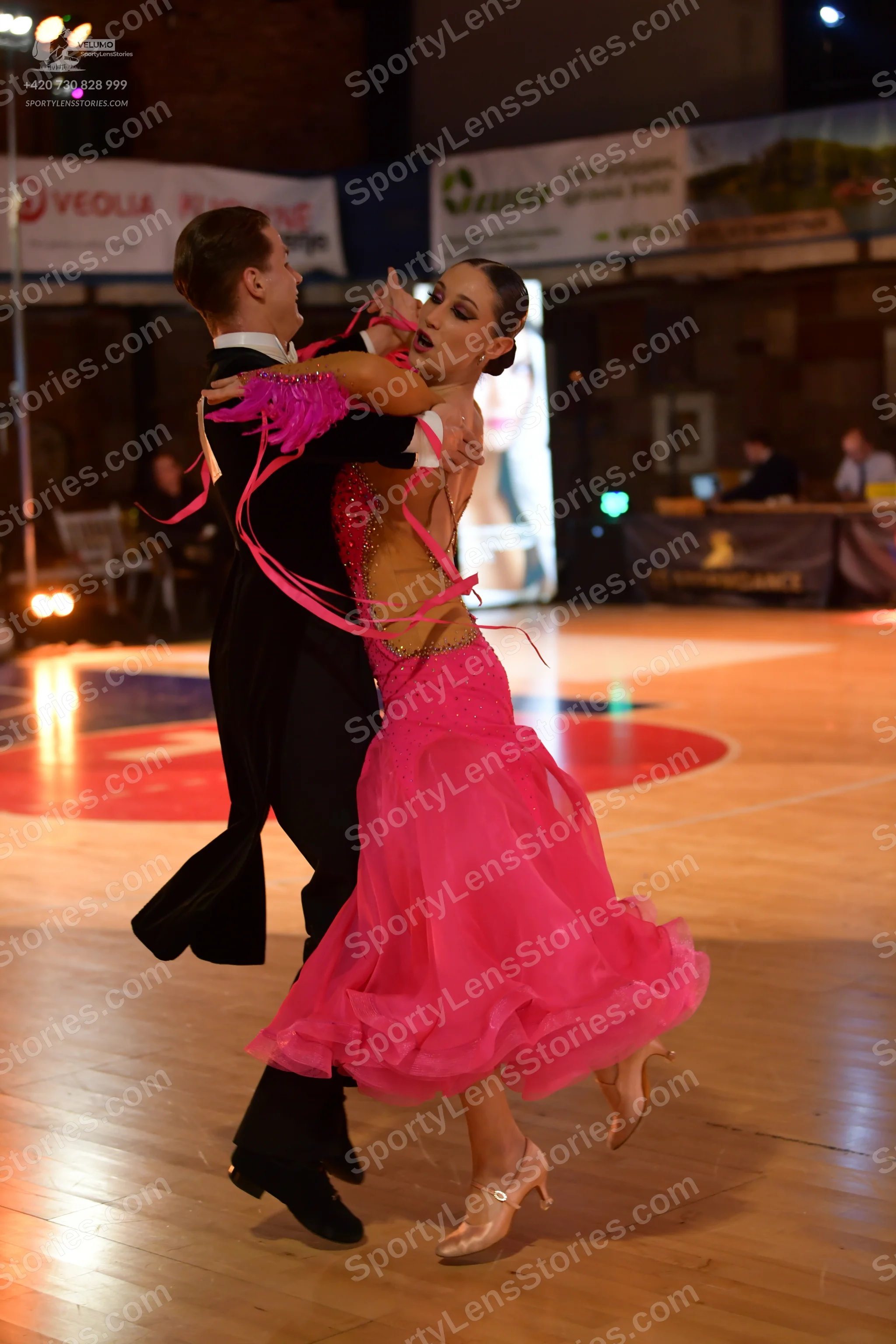 Dancesport competitor: Male dancer: black tailcoat, white shirt, and black bow tie