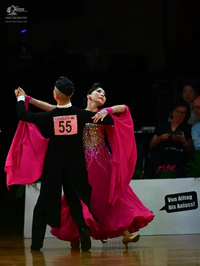 Dancesport competitor #55: Male dancer: black long-sleeved shirt and black trousers