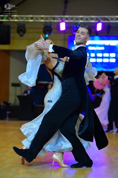 Dancesport competitor #116: Male dancer: black tailcoat, white shirt, and black bowtie
