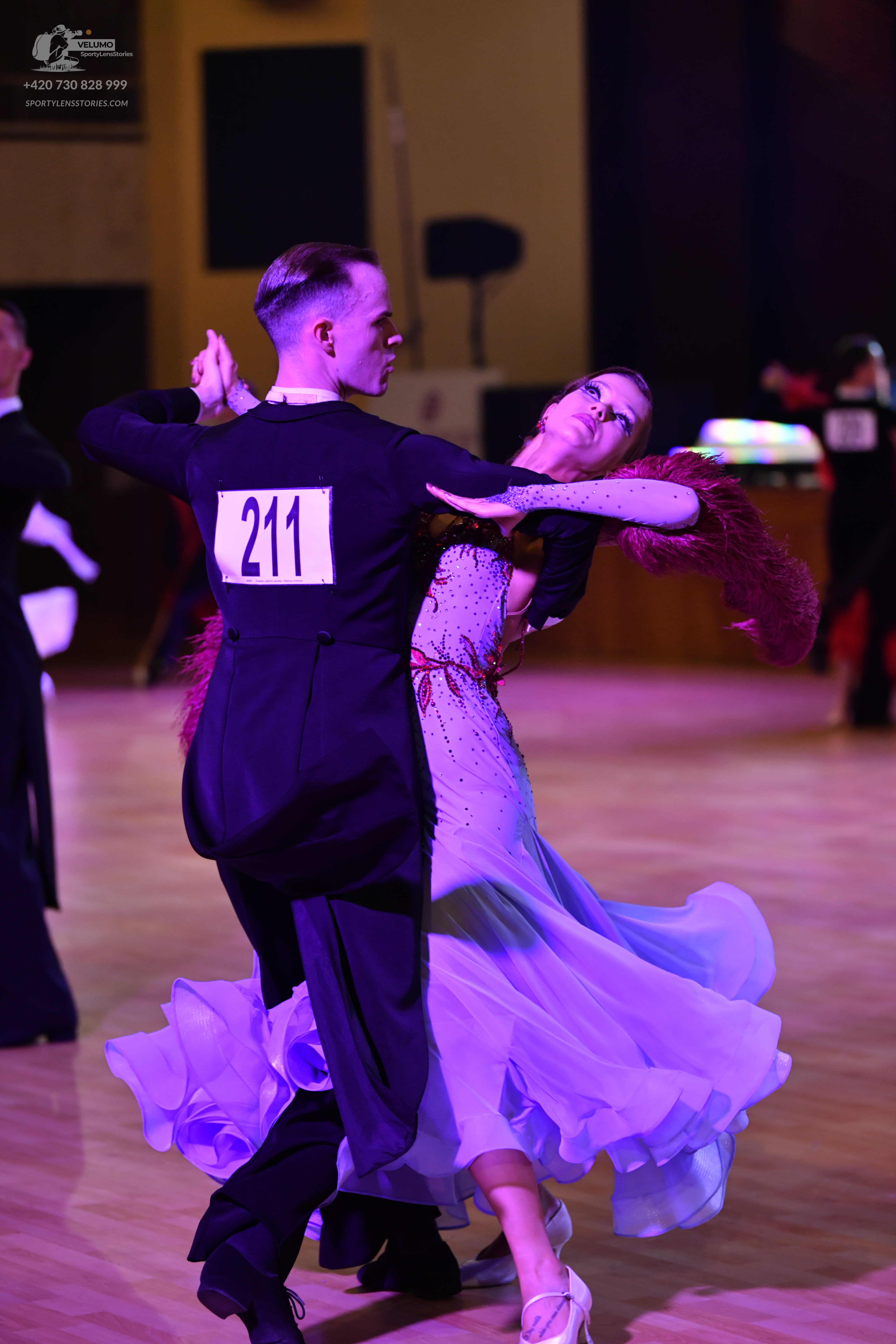 Dancesport competitor #211: Male dancer: black long-sleeved top and black trousers