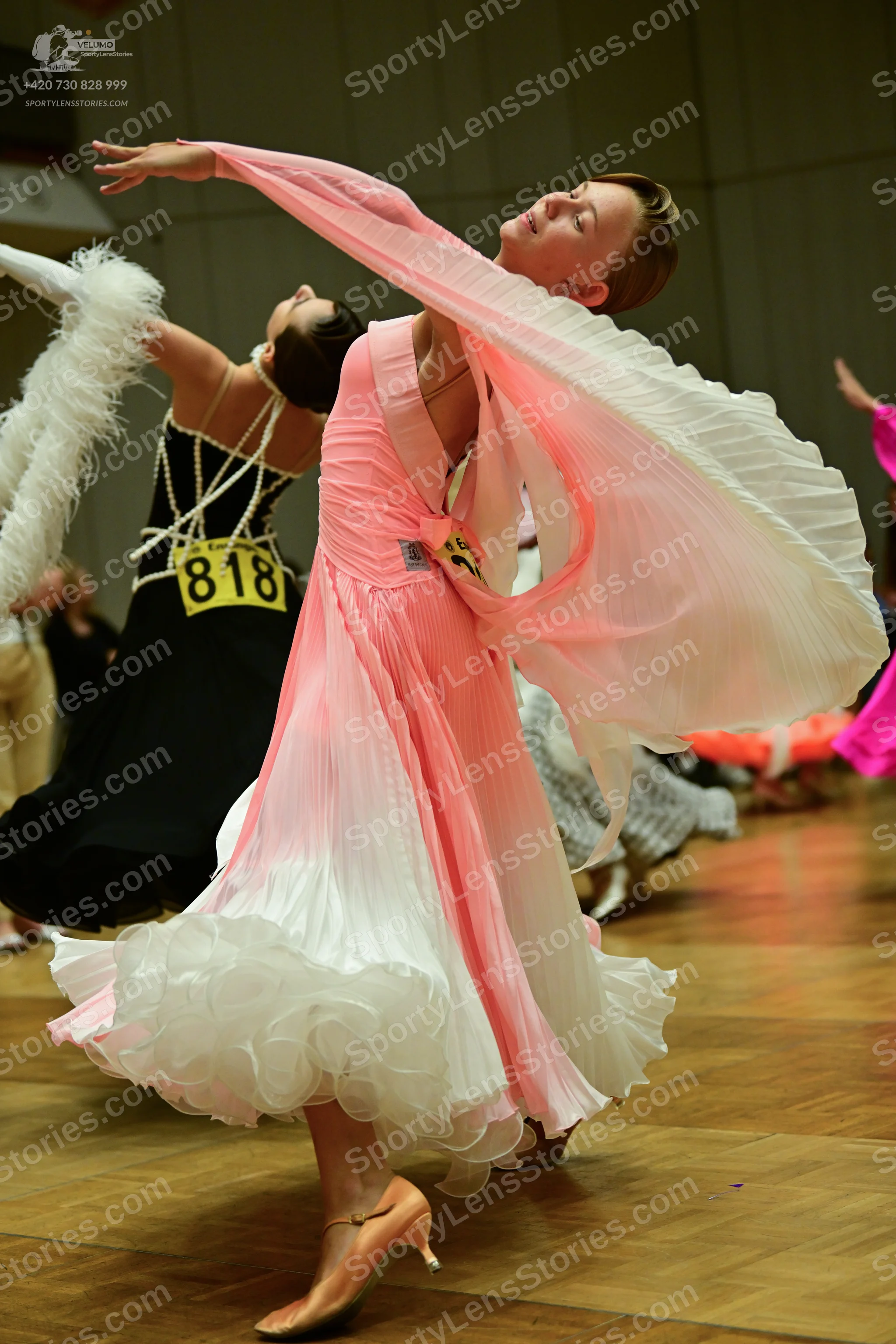 Dancesport competitor #818: ** Female: Light pink/peach pleated gown