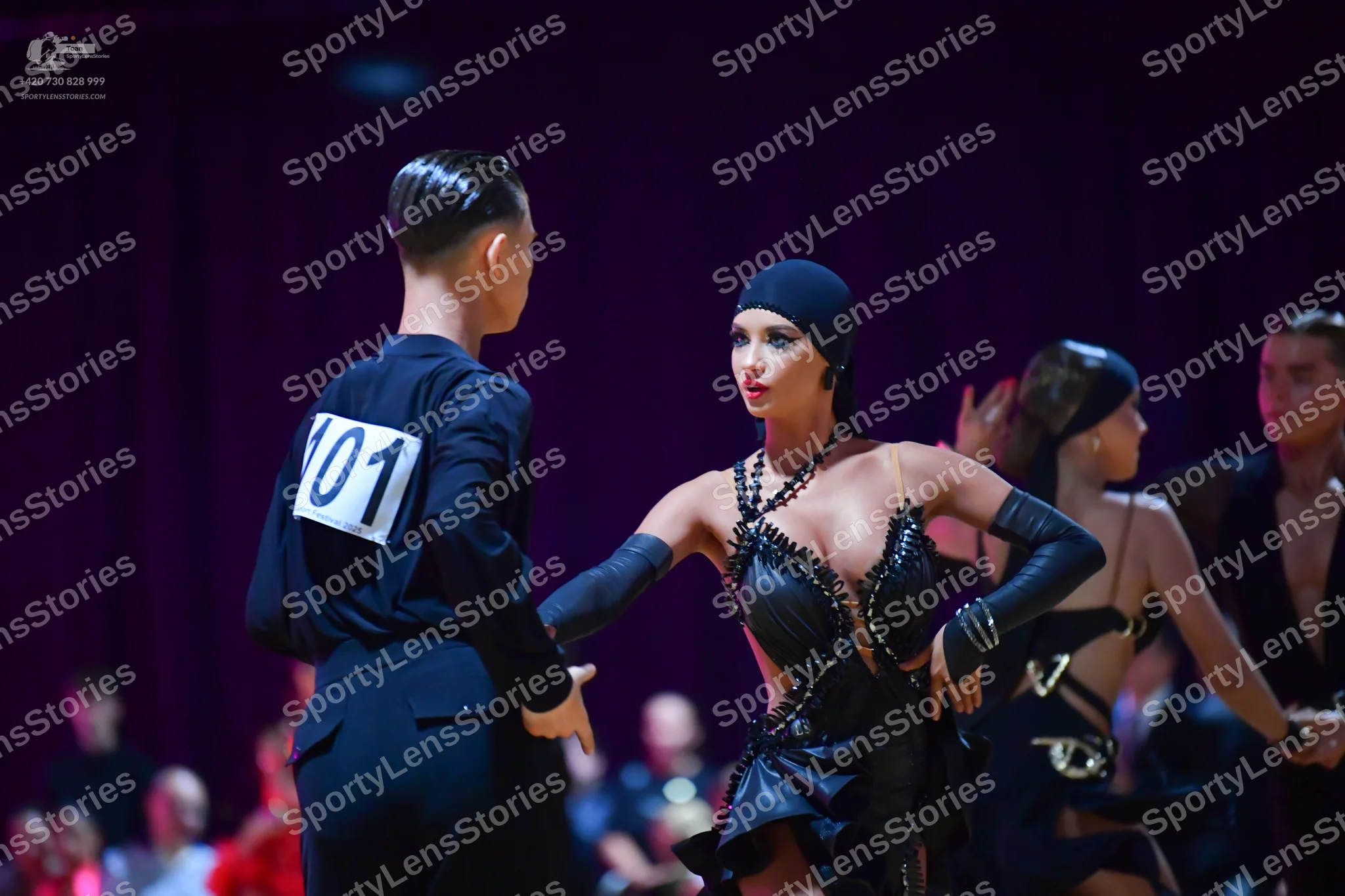 Dancesport competitor #101: Male dancer: black long-sleeved shirt and black trousers