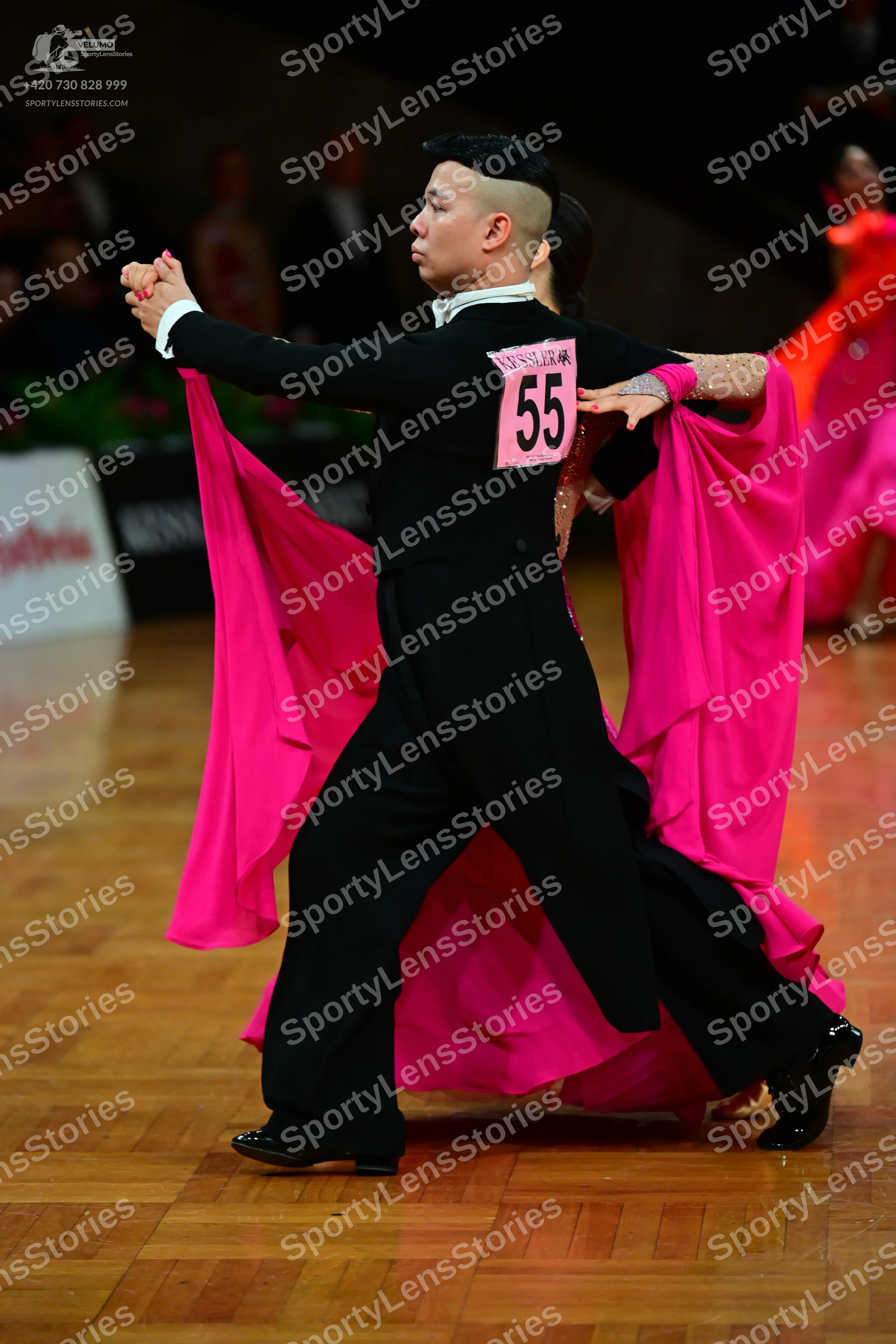 Dancesport competitor #55: Male dancer: black long-sleeved top and black trousers