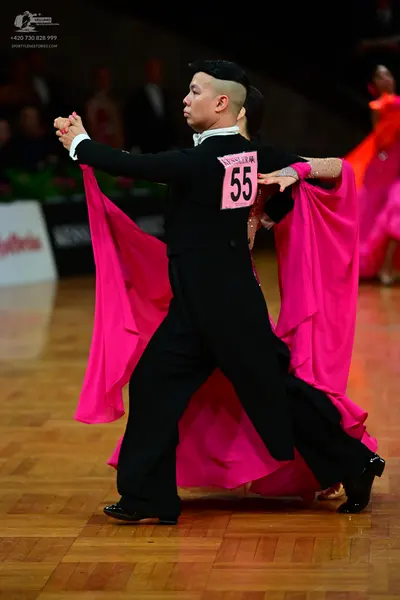 Dancesport competitor #55: Male dancer: black long-sleeved top and black trousers