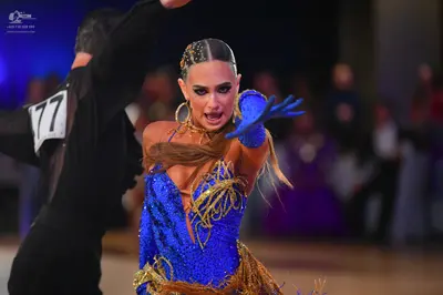 Dancesport competitor #77: Male dancer: black dance top
