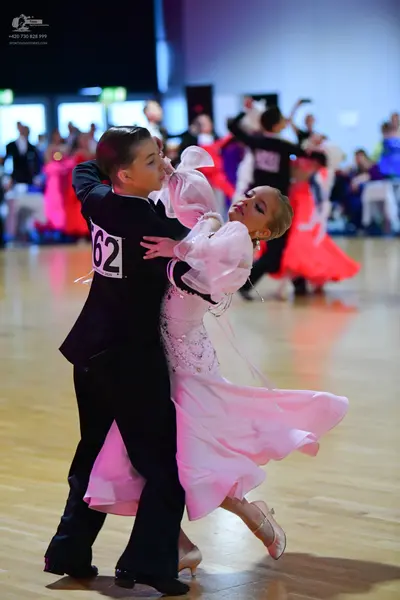 Dancesport competitor #62: Male dancer: black suit