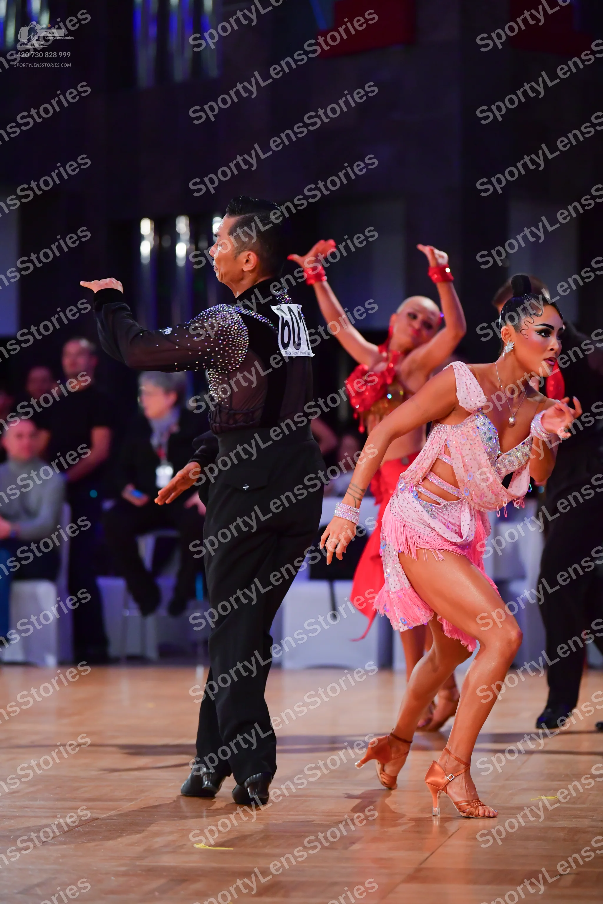 Dancesport competitor #60: Male dancer: black long-sleeved Latin shirt with sequins on the shoulder, black