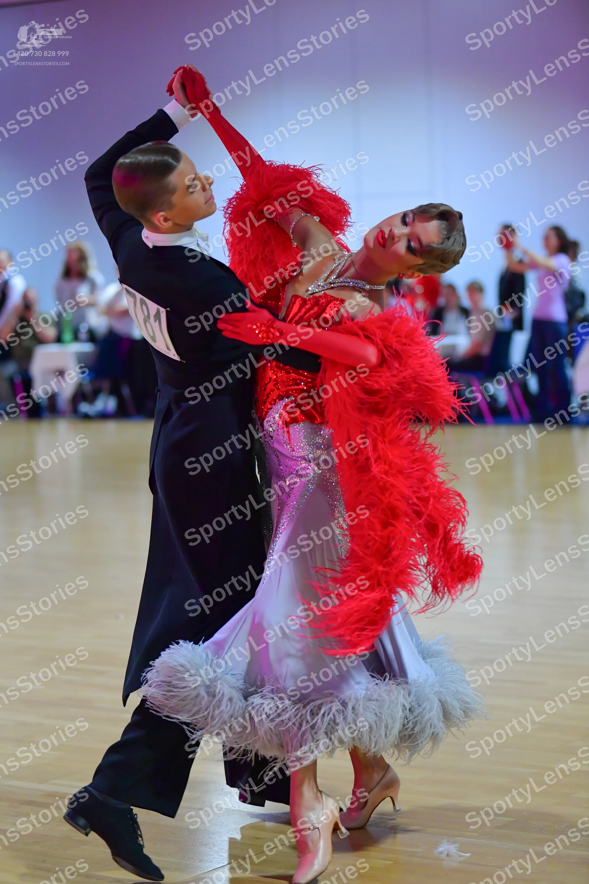 Dancesport competitor #81: Male dancer: black suit with a white shirt and black dance shoes