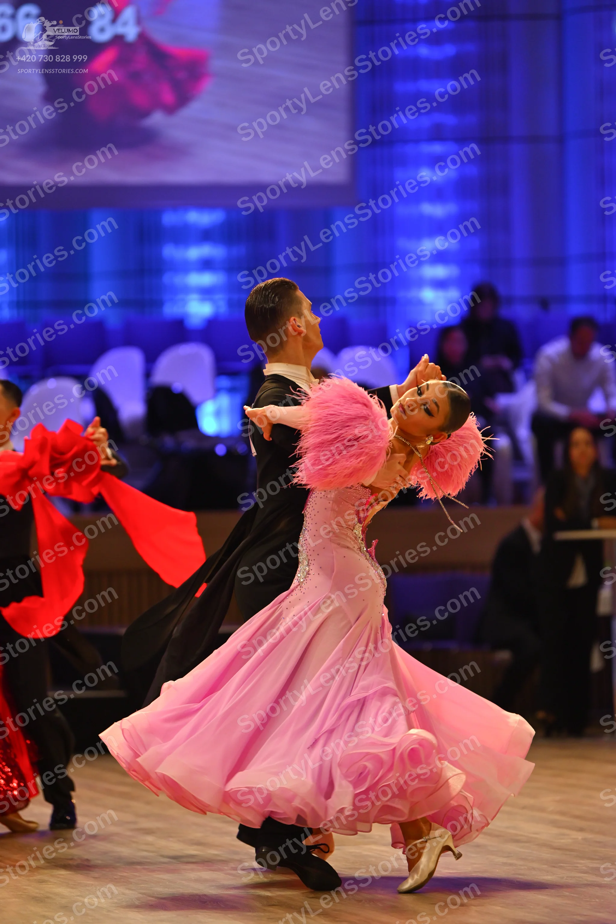 Dancesport competitor: Male dancer: black suit