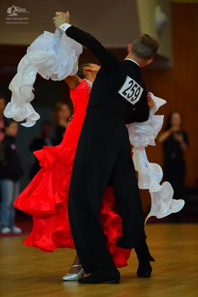 Dancesport competitor #259: Male dancer: black long-sleeved top and black trousers
